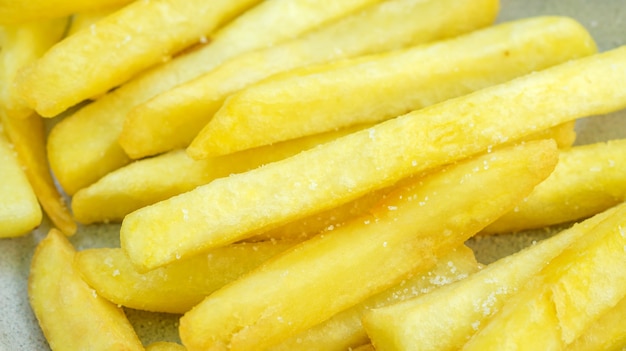 Close up of french fries on a table