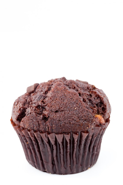 Photo close up of a fresh baked chocolate muffin