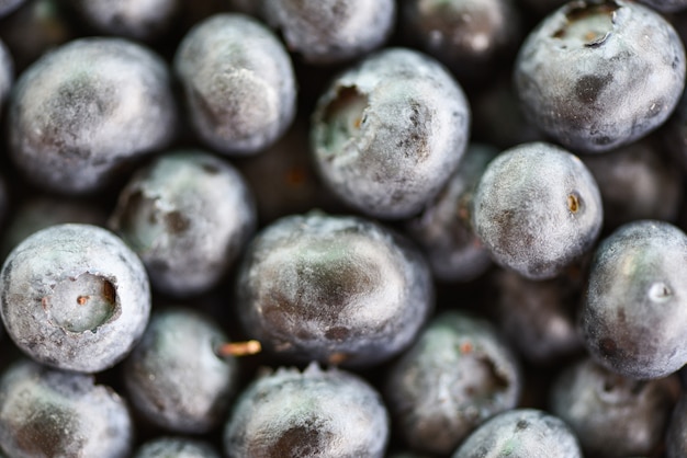 Close up of fresh blueberries texture - top view macro fruit 