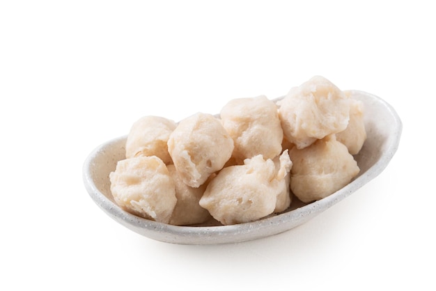 Close up of fresh cuttlefish ball isolated on white background, clipping path cut out.