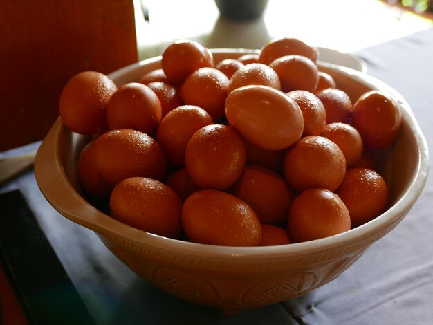 Close-up of fresh fruits in bowl on table