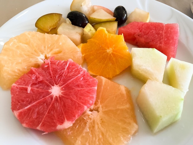 Close-up of fresh fruits served in plate