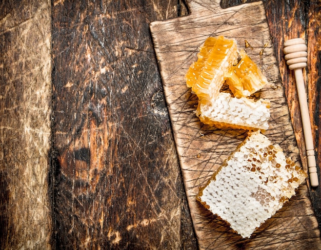 Close up on fresh honeycomb on the board