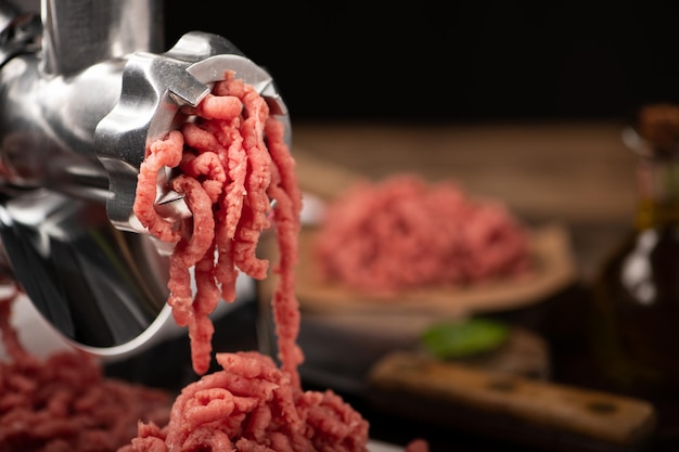 Close-up of a fresh minced meat in grinder