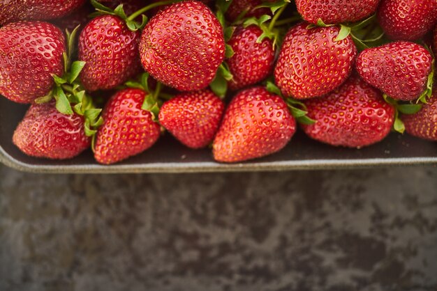 Close up of fresh natural strawberry fruit