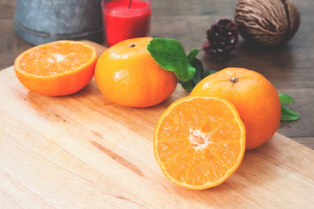 Close up of fresh orange on cutting board