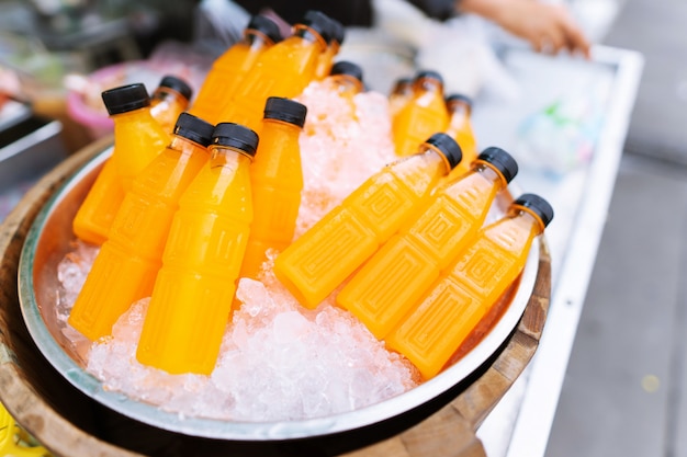 Close up of Fresh orange juice in plastic bottle