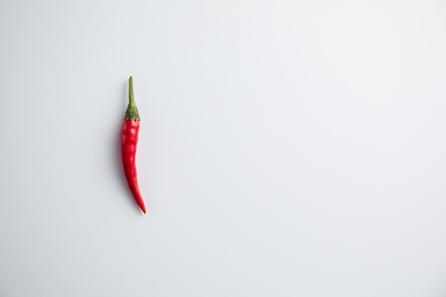 Close up on fresh ripe red pepper isolated