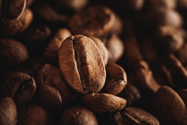 Close-up of a fresh roasted coffee beans on a heap.