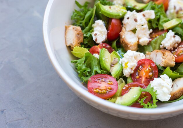 close up fresh salad with tomatoes