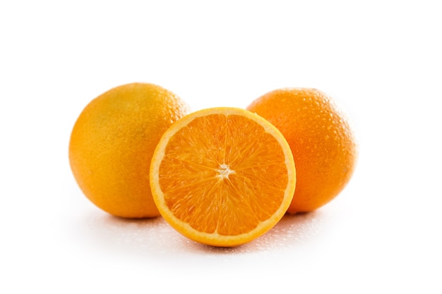 Close up fresh sunkist orange isolated on white