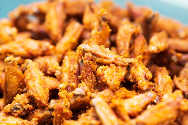 Close up of fried chicken, thai street food market