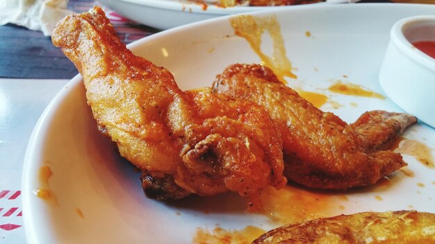 Close-up of fried chicken wings served in plate