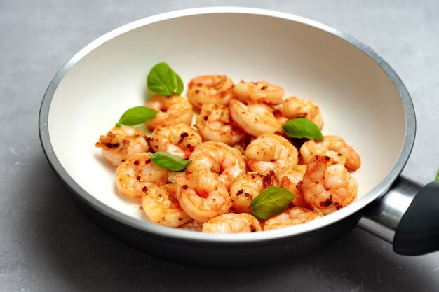 Close up of fried king prawns in a pan