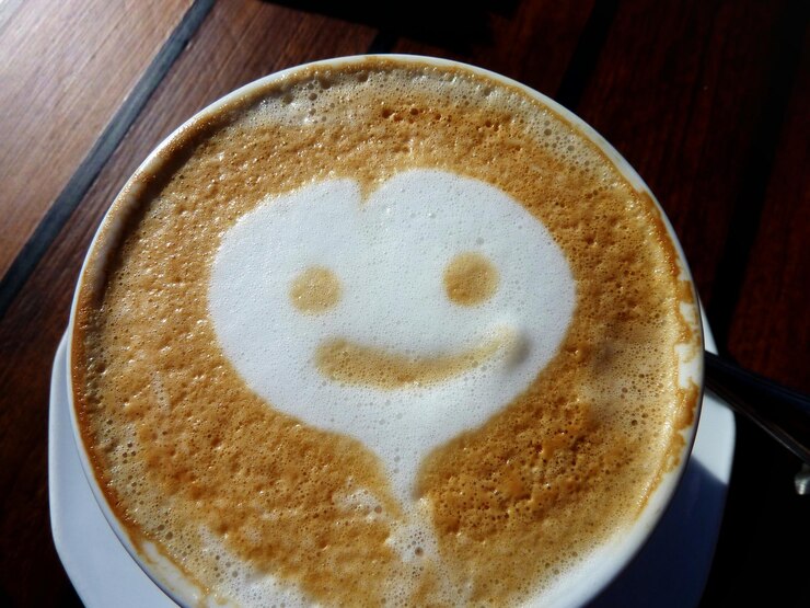 Photo close-up of froth art on coffee