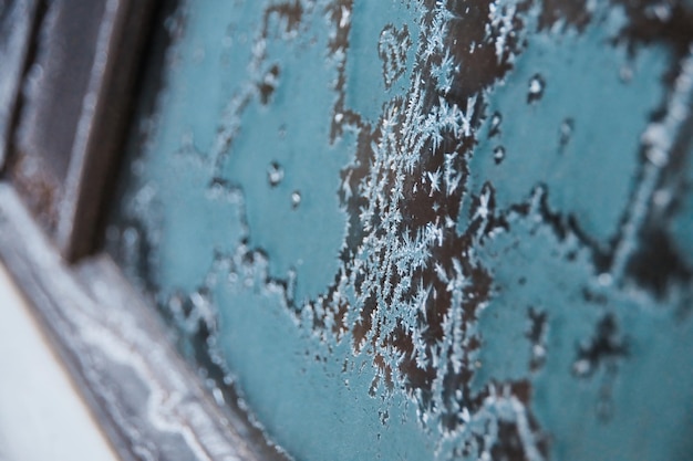 Photo close-up of frozen car window