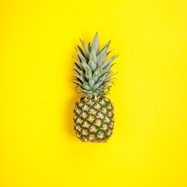 Close-up of fruit against yellow background