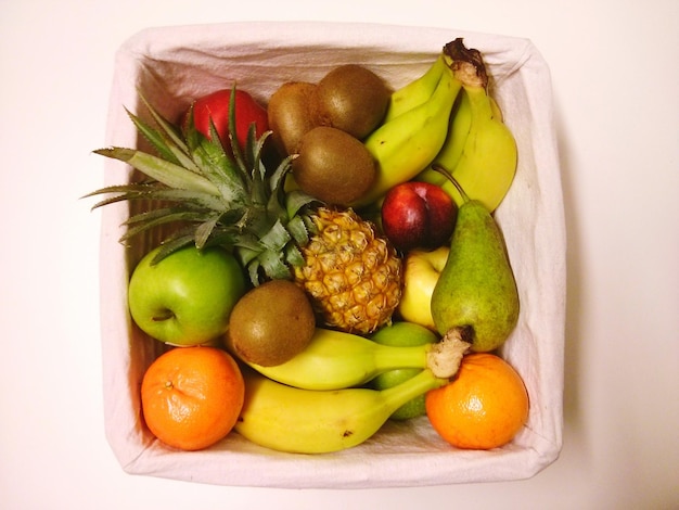 Photo close-up of fruit over white background