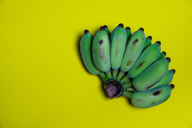 Close-up of fruit over yellow background