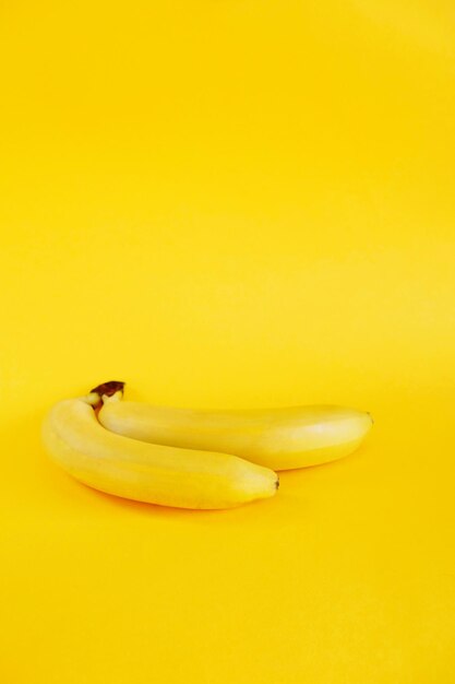 Close-up of fruit over yellow background