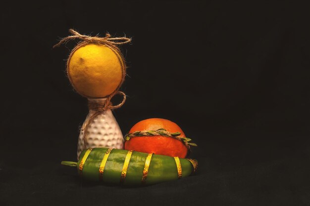 Photo close-up of fruits against black background