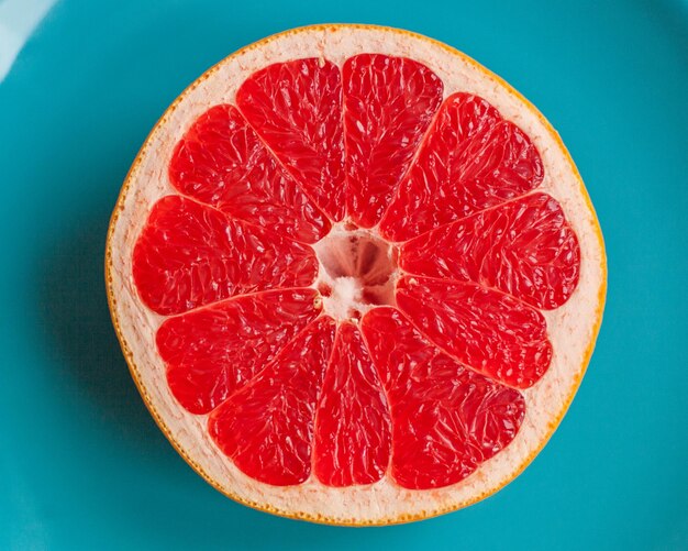 Photo close-up of fruits against blue background