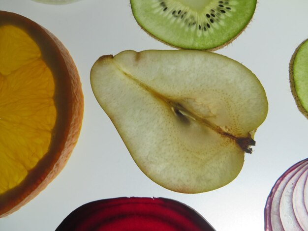 Photo close-up of fruits against white background