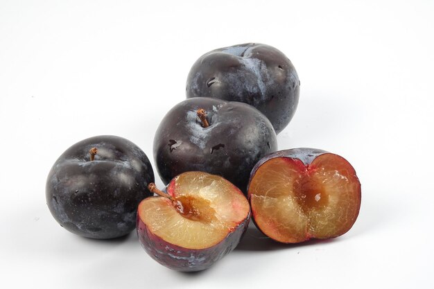 Photo close-up of fruits against white background