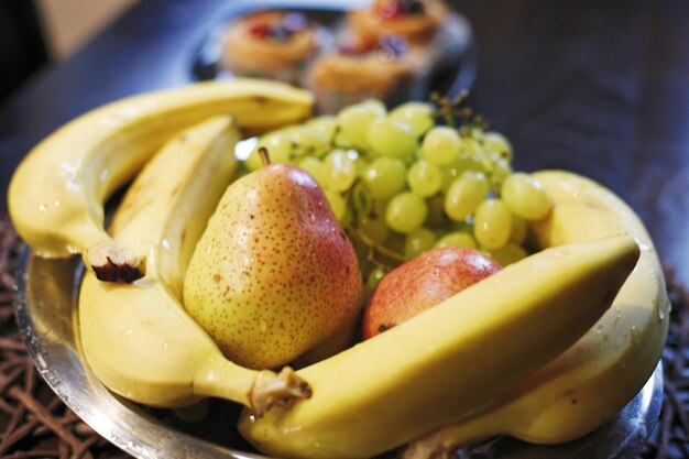 Close-up of fruits in bowl on table