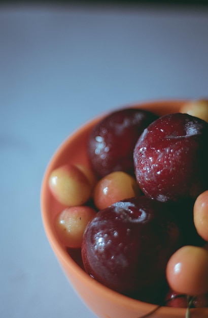 Close-up of fruits in bowl on table