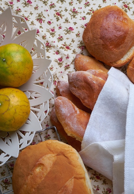 Close-up of fruits and breads on table