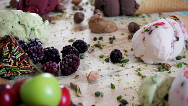 Photo close-up of fruits and ice cream on table