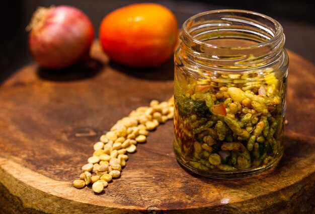 Close-up of fruits in jar on table