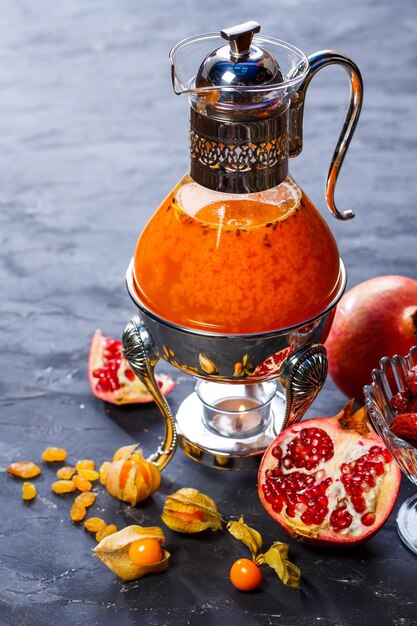 Close-up of fruits in jar on table