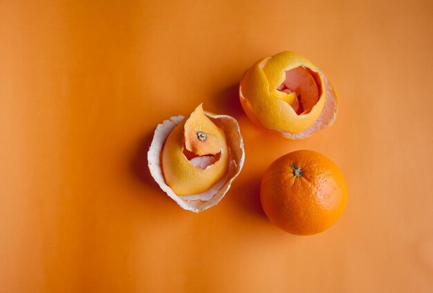 Close-up of fruits on orange background