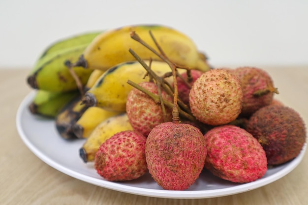 close-up of fruits in plate on table