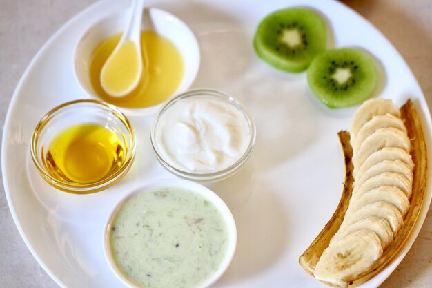 Close-up of fruits in plate on table