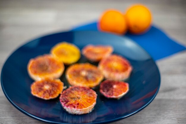 Close-up of fruits in plate on table