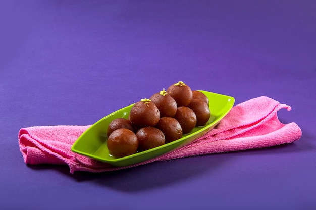 Close-up of fruits in plate on table