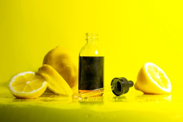 Close-up of fruits on table against yellow background