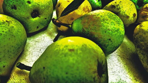 Photo close-up of fruits in tree