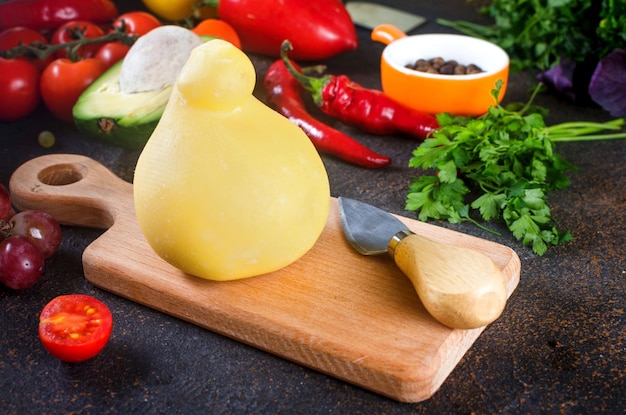 Photo close-up of fruits and vegetables on cutting board