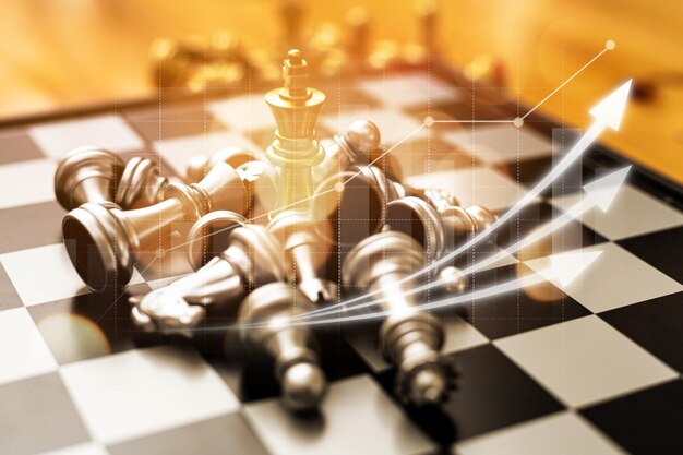 Close-up of a game of chessboard with chess pieces. Chessboard Concept vs. Business Management on Risk, Graphic Charts Showing Financial Flows and Business Performance. Risk management.