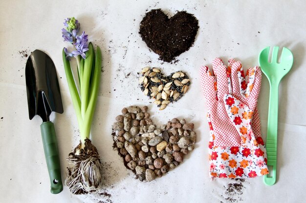 Close-up of gardening equipment on table