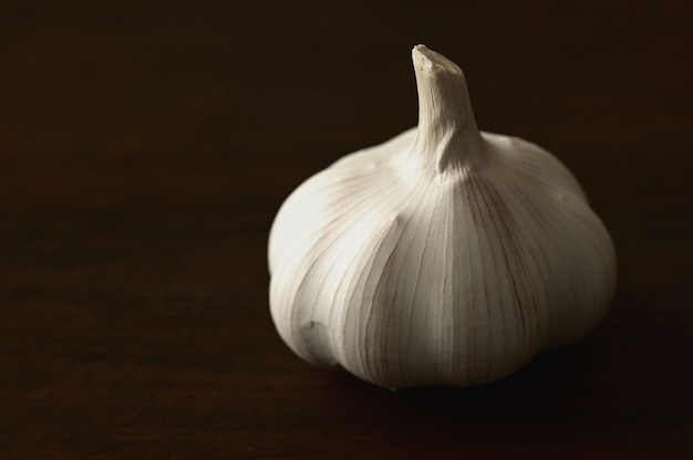 Close-up of garlic on a wooden table