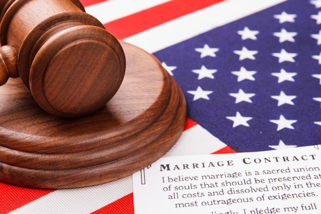 Close-up gavel and flag of the usa. Marriage contract concept.