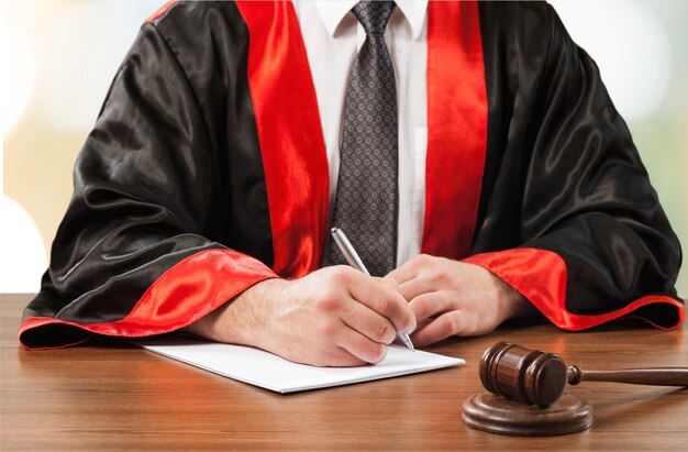 Close-up gavel judge with lawyer working at courtroom