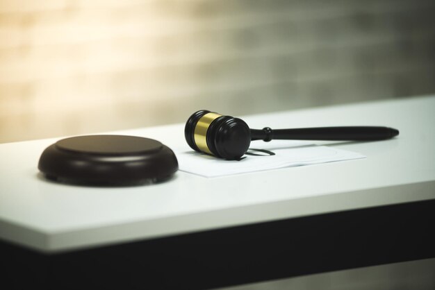 Close-up of gavel on table