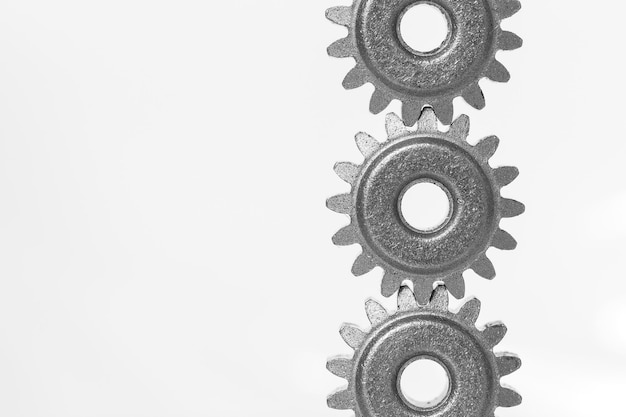 Photo close-up of gears against white background