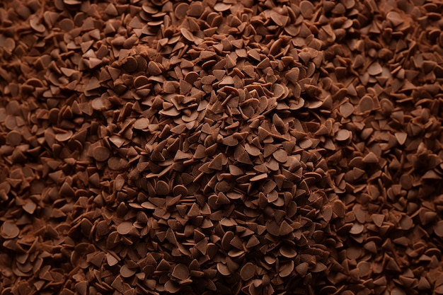 Photo close up generative ai picture of broken grated chocolate natural ingredient for desserts